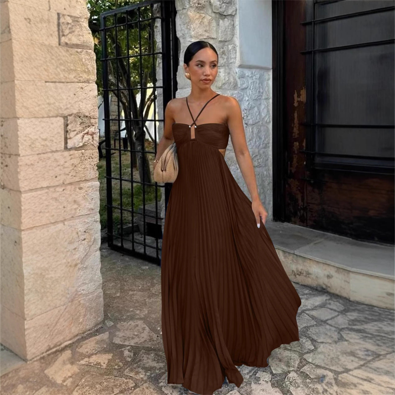 Elegant Long Pleated Dress with Cross Straps – Graceful Flow and Timeless Sophistication