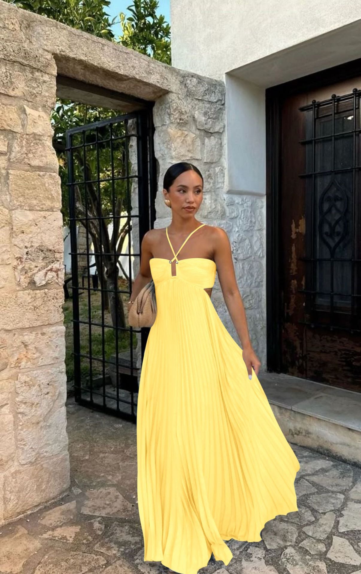 Elegant Long Pleated Dress with Cross Straps – Graceful Flow and Timeless Sophistication