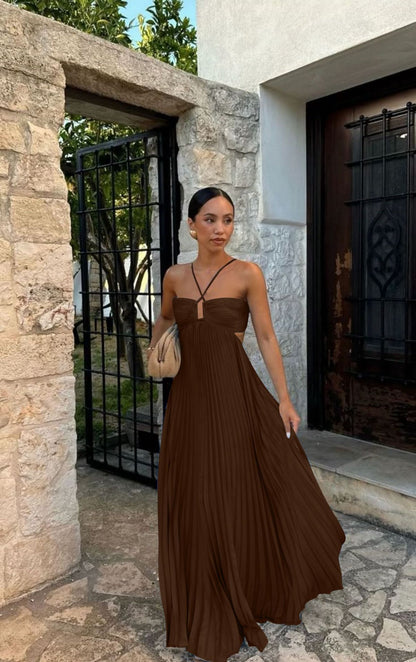 Elegant Long Pleated Dress with Cross Straps – Graceful Flow and Timeless Sophistication